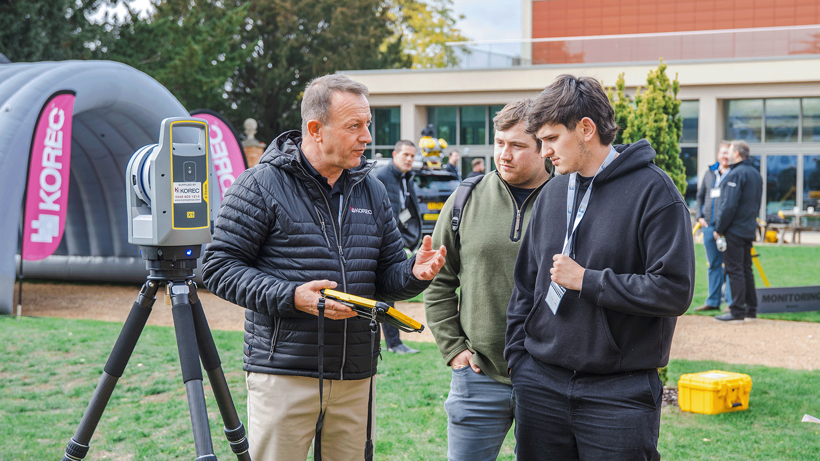 Explaining laser scanning outside at KTUC25
